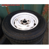 Original Jaguar Mark II wheels and tyres (5) Used and in good condition, one with a new tyre
