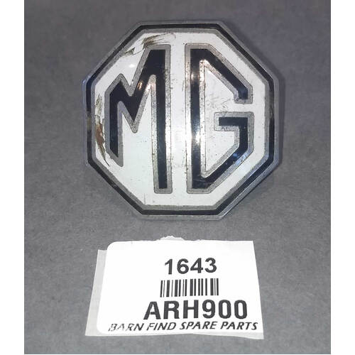 Original Used MG ARH900 Spare wheel medallion Black and White