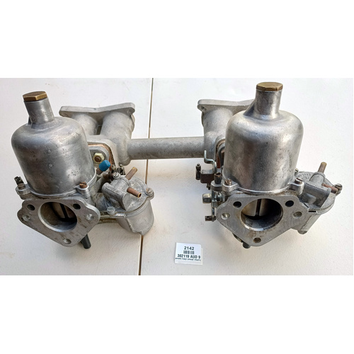 Original Triumph TR2 TR3 TR3A  High Port Inlet Intake Manifold 302119 with twin 1.75 inch HS6 SU AUD 9 carburettors. Very Good USED condition.