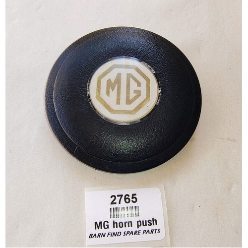 MG wheel centre horn push white and gold plastic centre - used