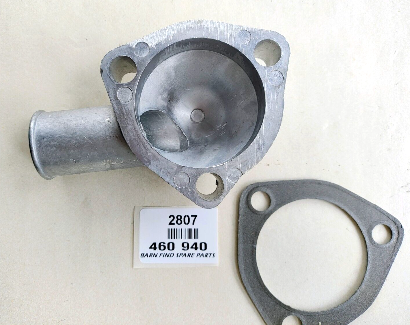 THERMOSTAT Alloy Housing 460-940 New Old Stock. includes gasket.5