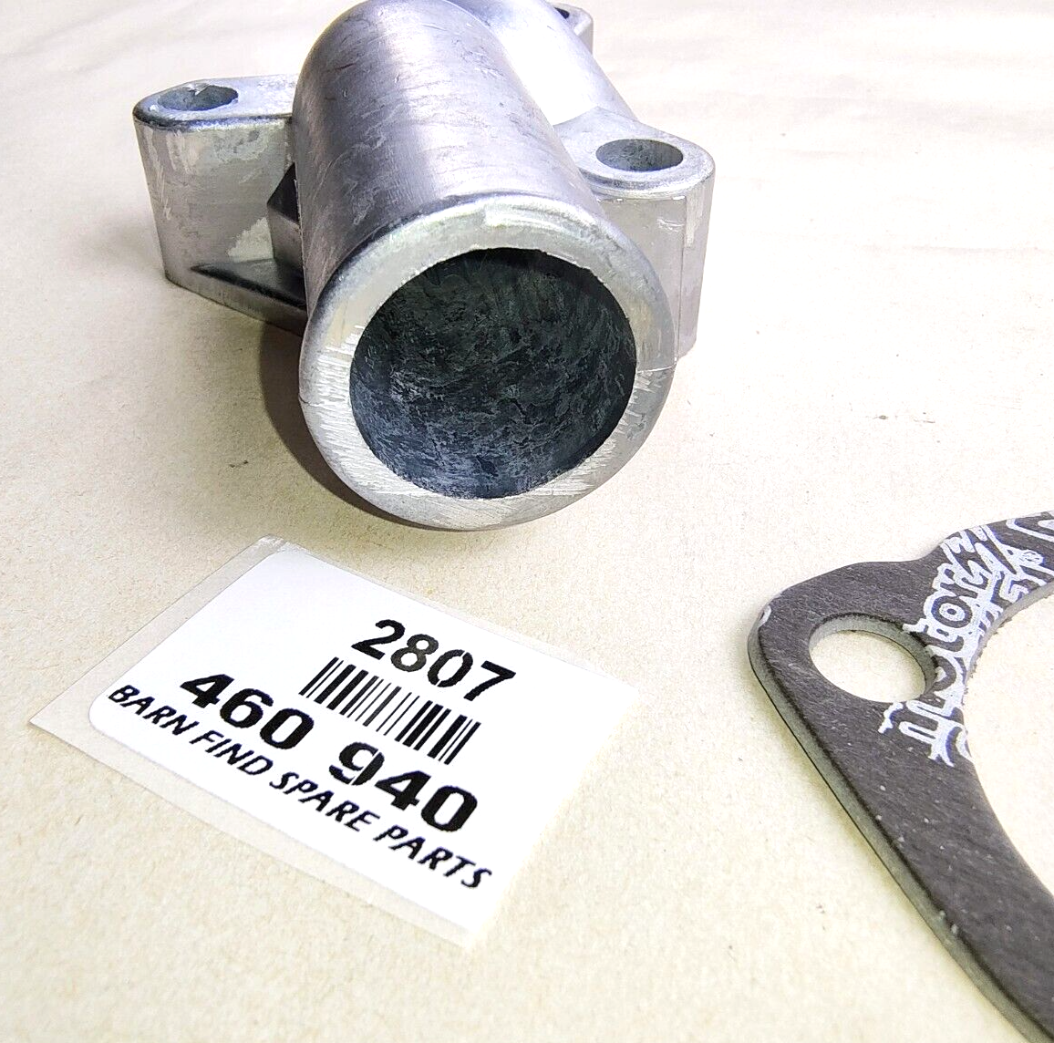 THERMOSTAT Alloy Housing 460-940 New Old Stock. includes gasket.2