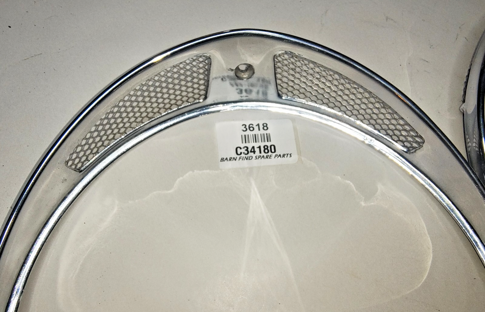JAGUAR DAIMLER Original pair of METAL Chrome 7" meshed headlamp trim/rims C3418011
