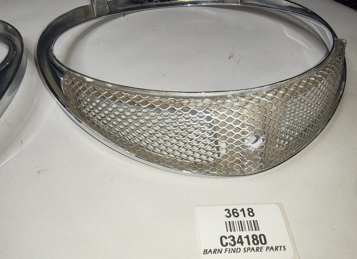 JAGUAR DAIMLER Original pair of METAL Chrome 7" meshed headlamp trim/rims C341807