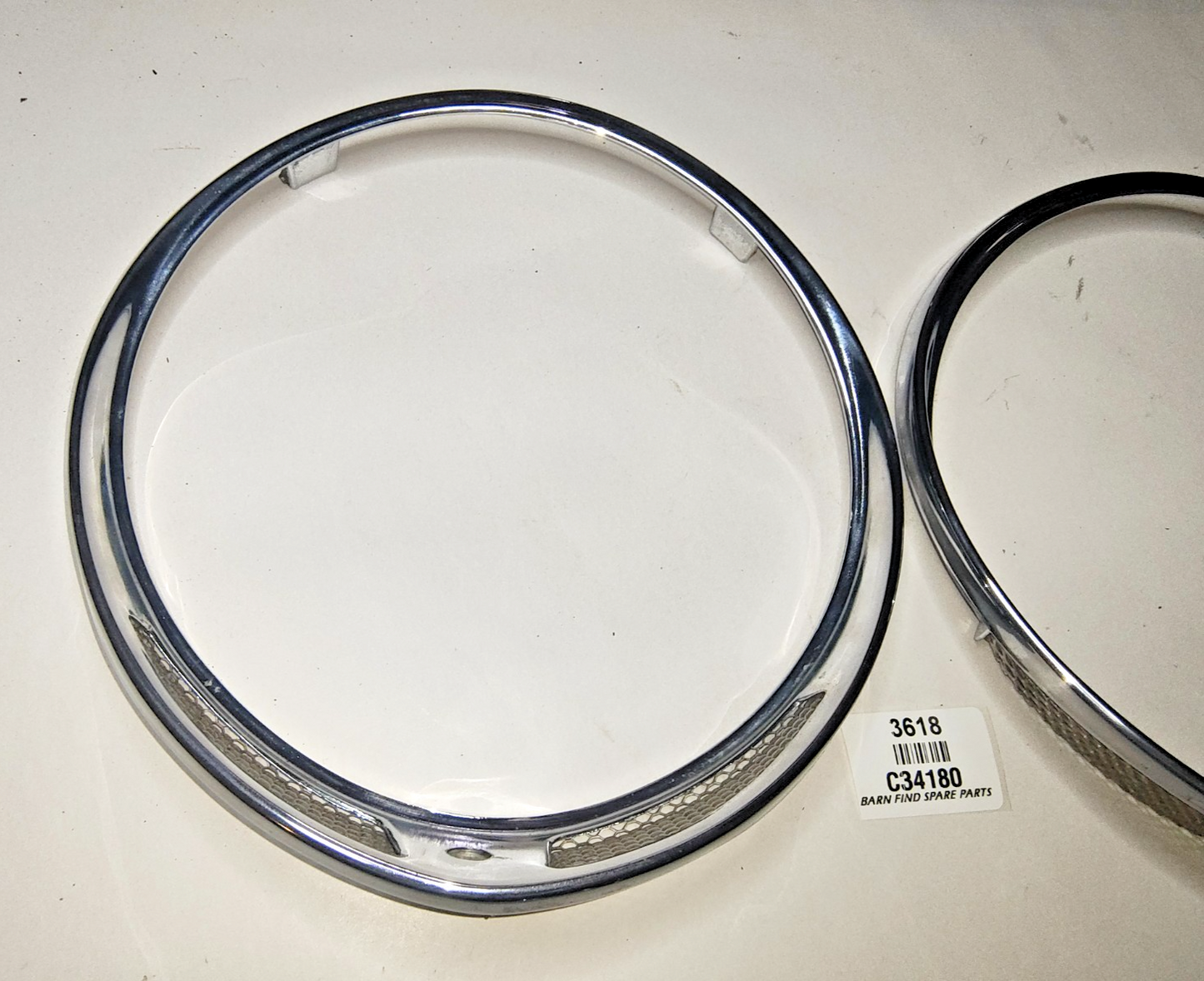 JAGUAR DAIMLER Original pair of METAL Chrome 7" meshed headlamp trim/rims C341802