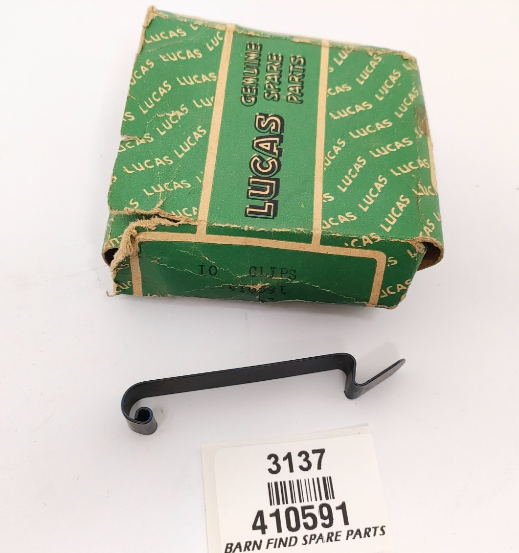 Lucas distributor cap clip 410591 New Old Stock Overall length 65mm x 9mm wide0