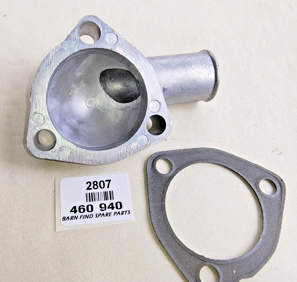 THERMOSTAT Alloy Housing 460-940 New Old Stock. includes gasket.4