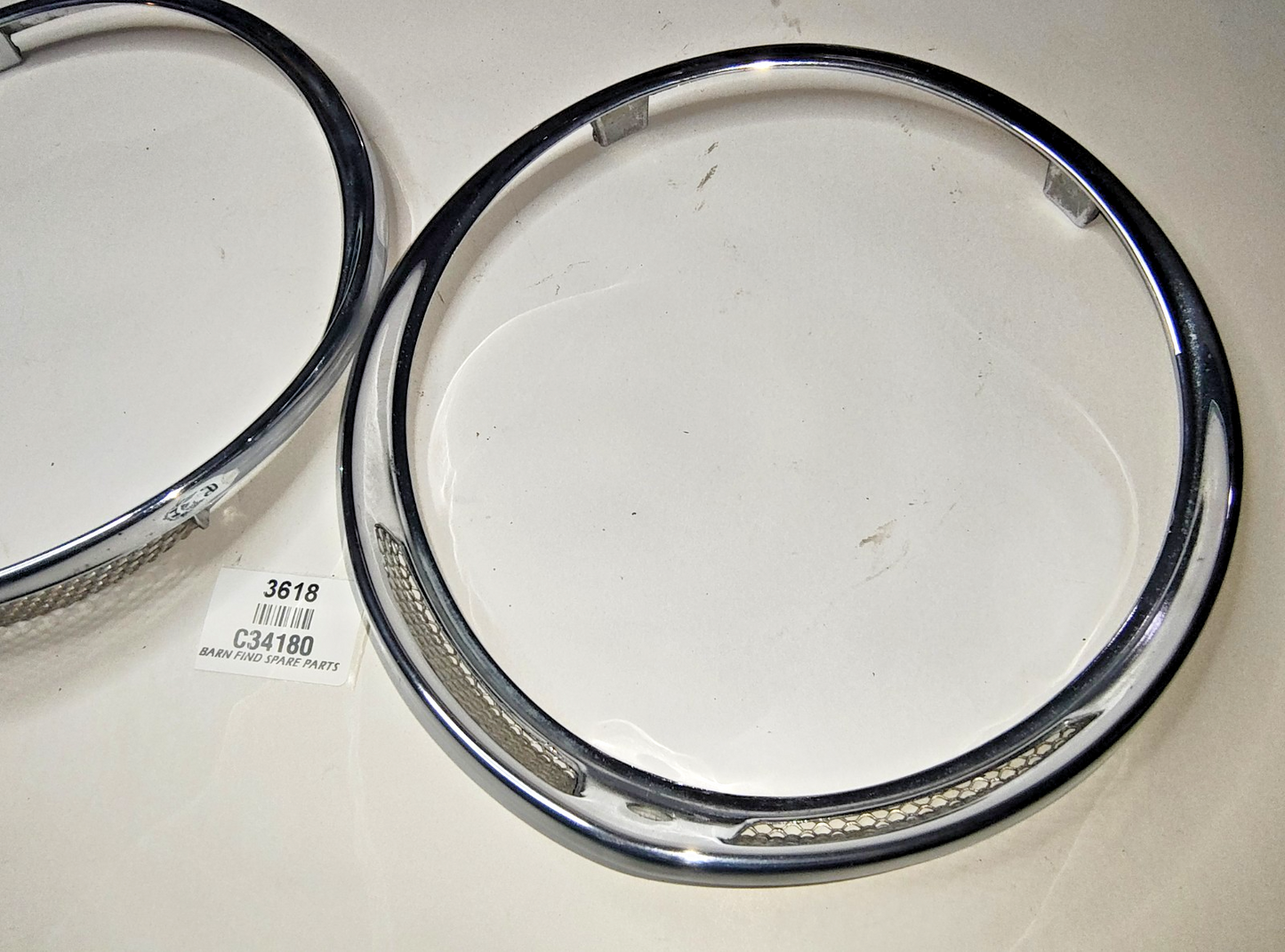 JAGUAR DAIMLER Original pair of METAL Chrome 7" meshed headlamp trim/rims C341803