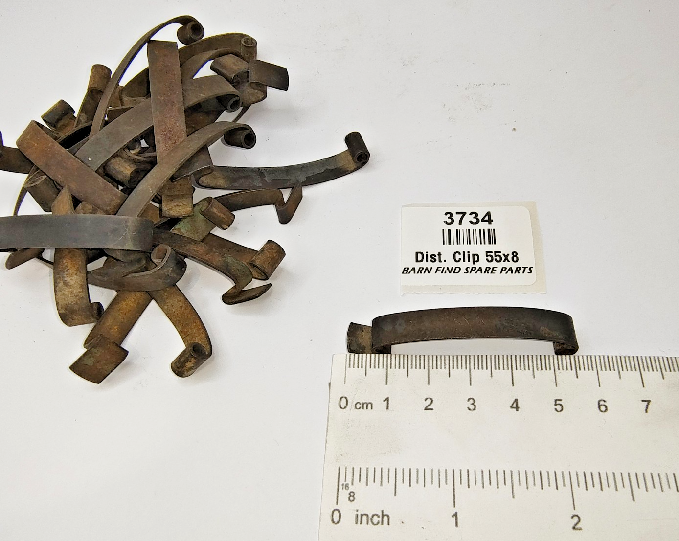 Lucas Distributor Clip Used Length 55mm Width 8mm Pivot to Nose 40mm sold each0