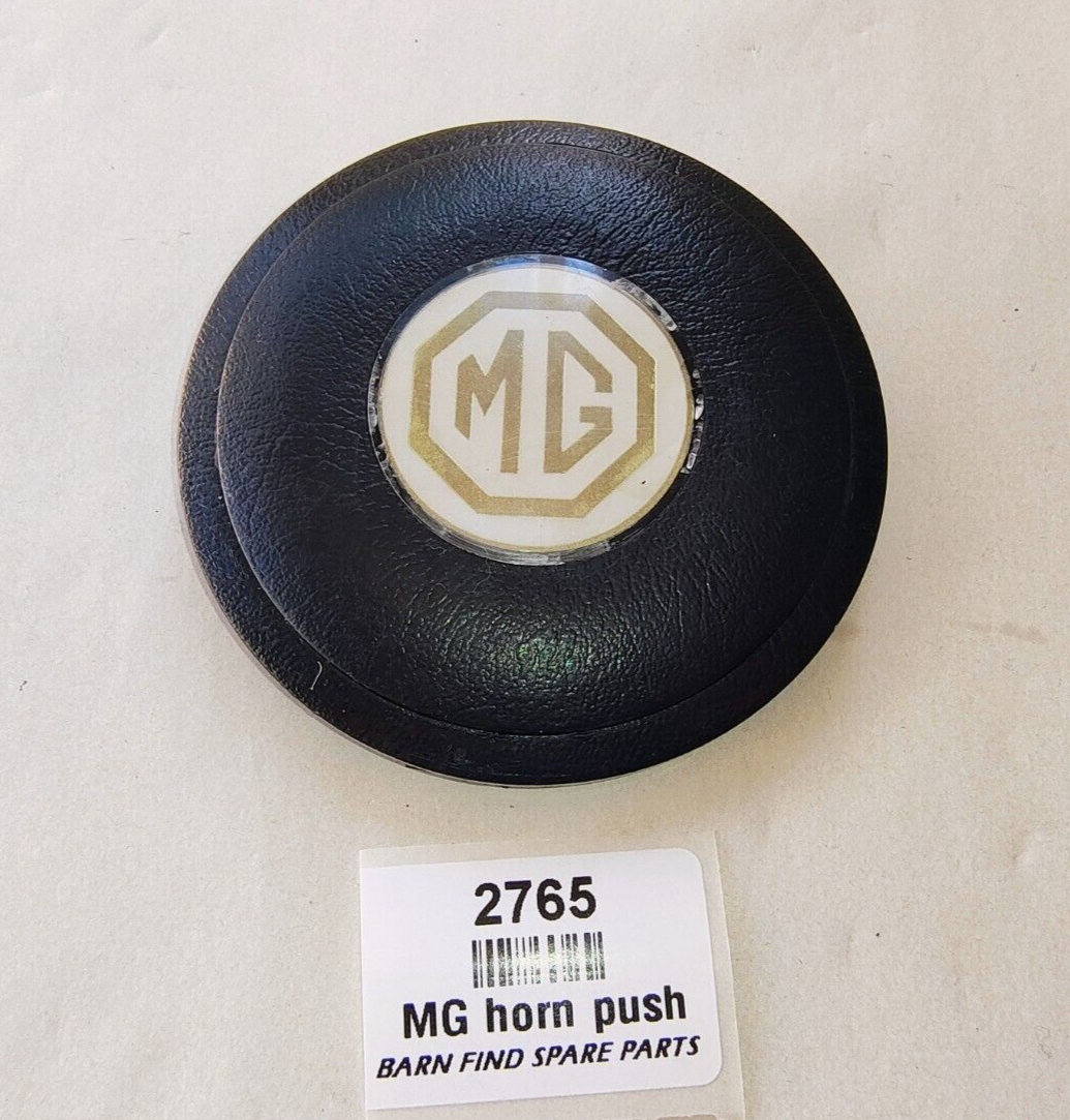 MG wheel centre horn push white and gold plastic centre - used0
