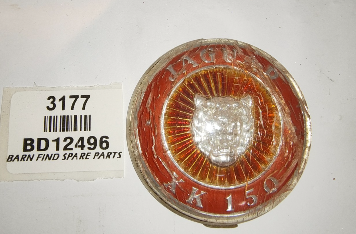 Original plastic Jaguar XK150 Grill Badge BD12496 used1